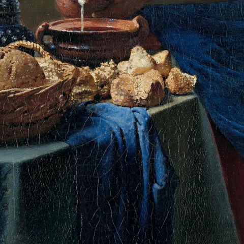 Brood op tafel in Het Melkmeisje van Johannes Vermeer